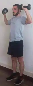 descente maitrisée shoulder press haltères